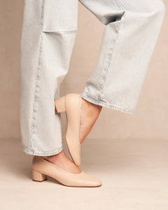 Oya Culford heel, a light blush pink women's low heel made in extended or large shoe sizes, worn by model.